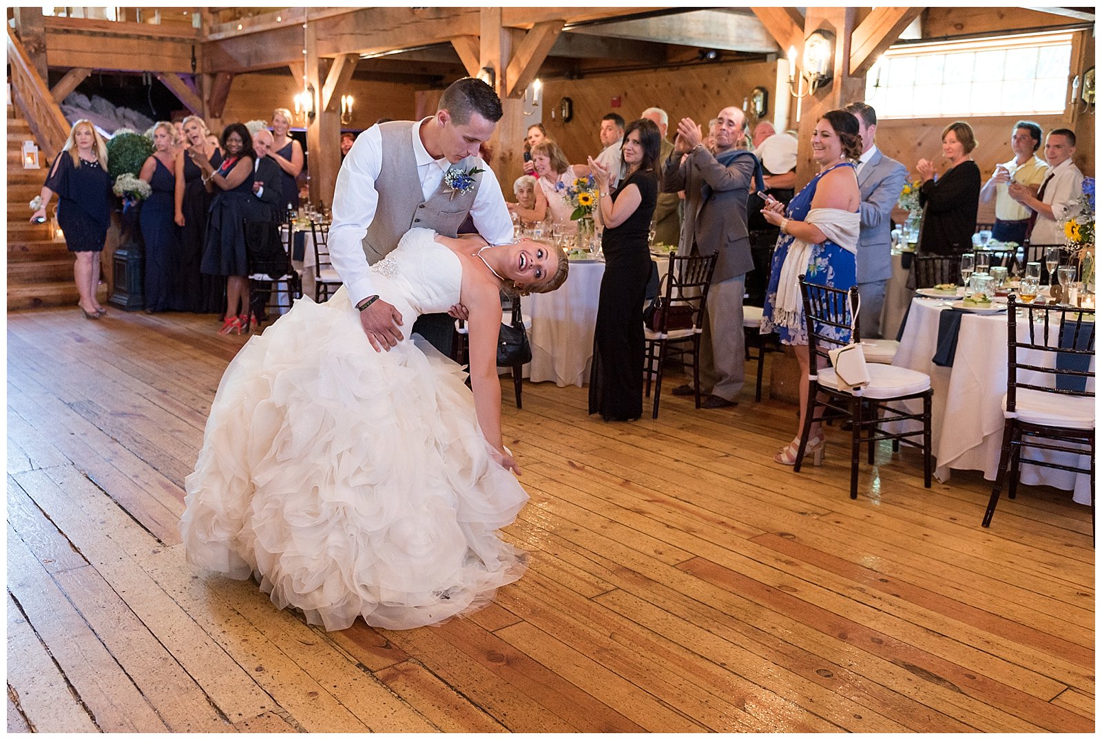 Groom dips bride during their first dance at their red lion inn wedding on the south shore of Massachusetts
