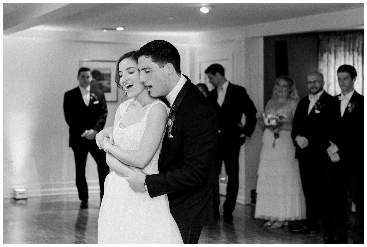 bride and groom first dance snuggle