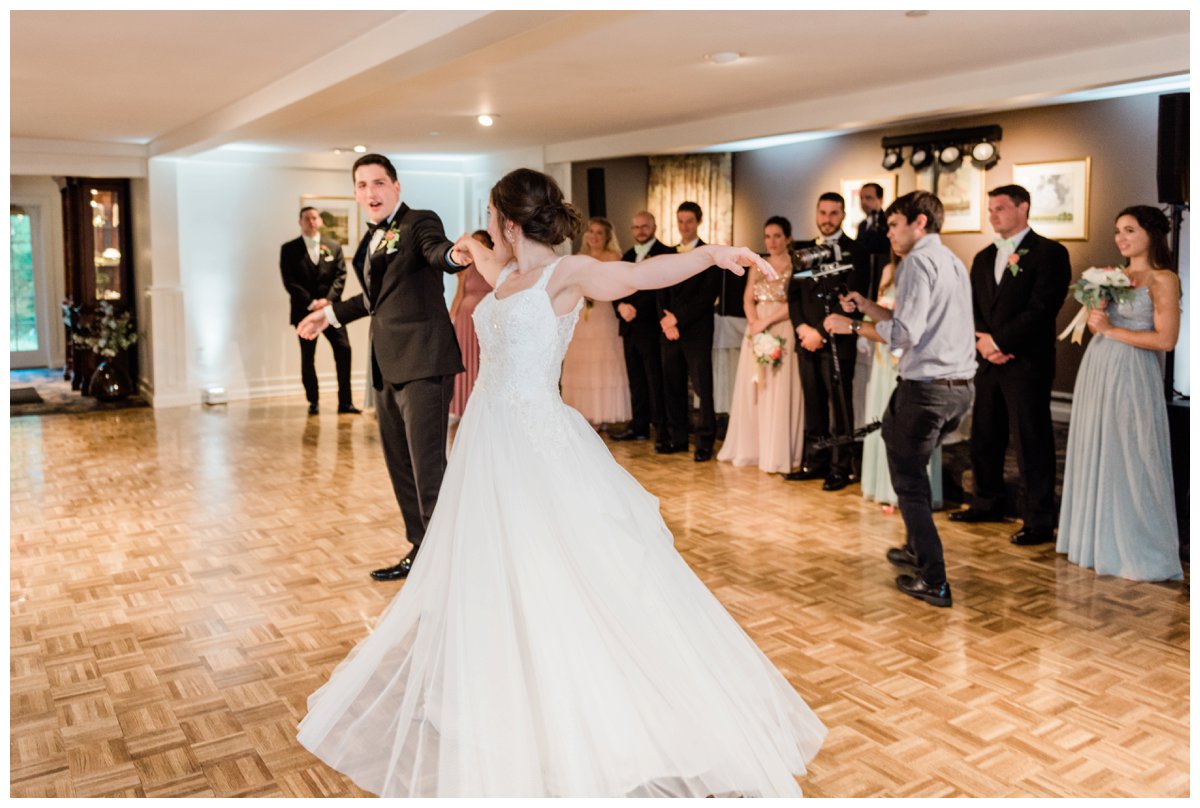 bride and groom first dance twirl