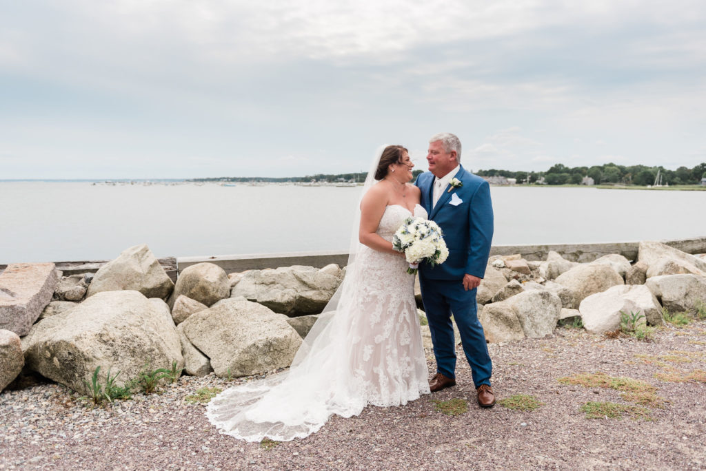 bride and groom by Duxbury Bay