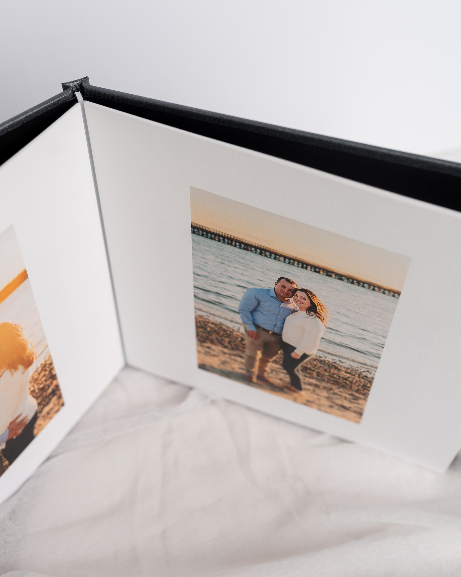 wedding guest book with engagement photos
