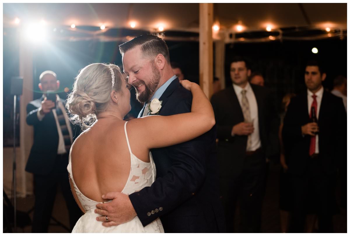first dance under the tent at the waterfront venue
