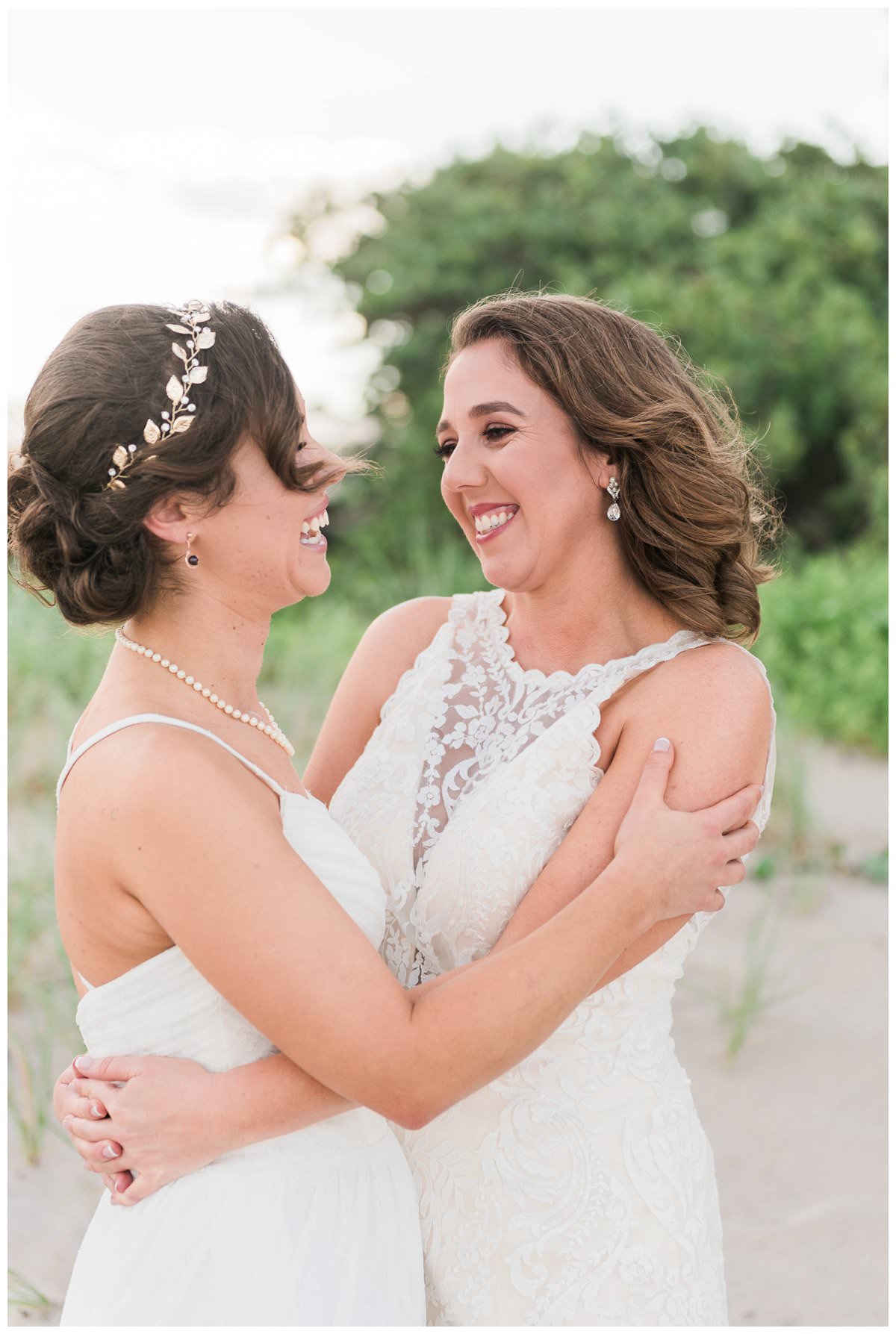 portrait of two brides in palm beach same sex wedding
