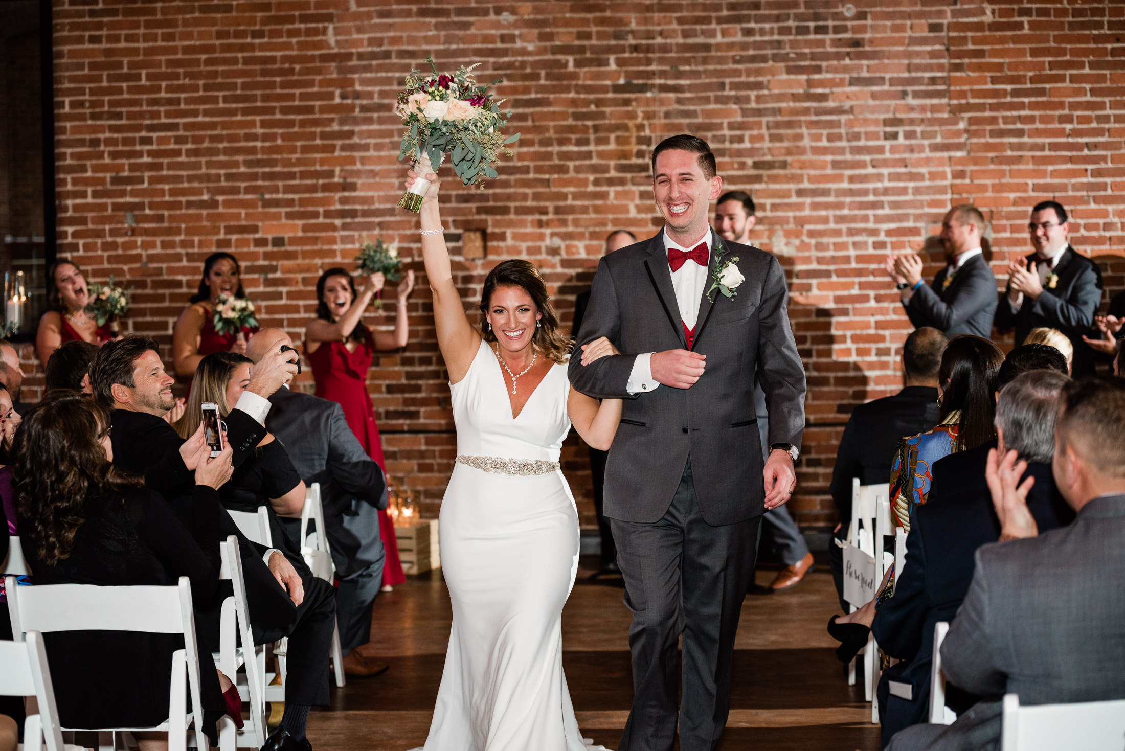 Industrial wedding ceremony at charles river museum in waltham ma