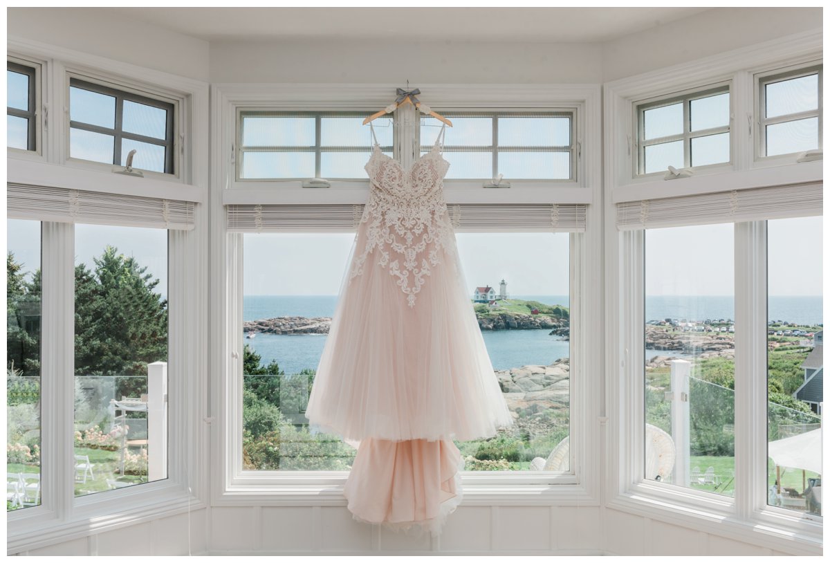 viewpoint hotel bridal suite bridal gown hanging in window