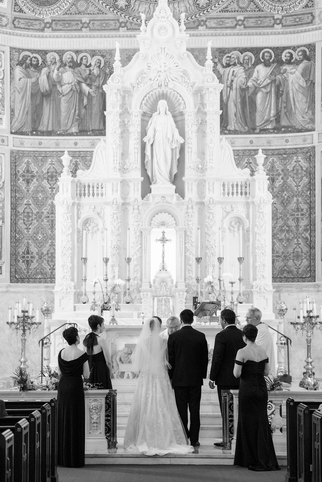 wedding party at the alter in St Edward's church Palm Beach