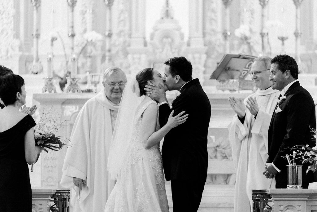 Bride and Groom first kiss St Edward's church Palm Beach