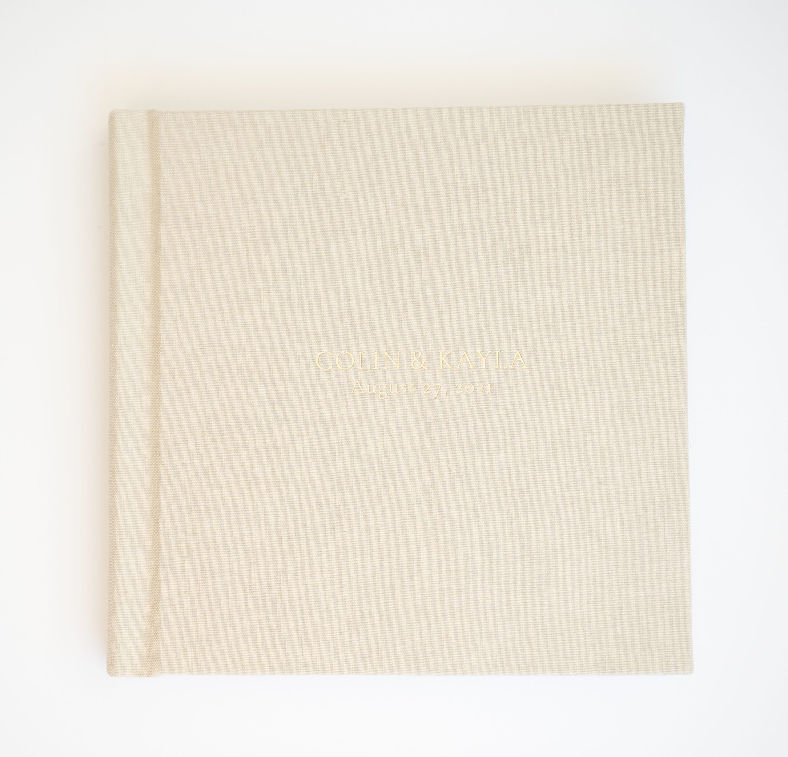 linen album with gold text example