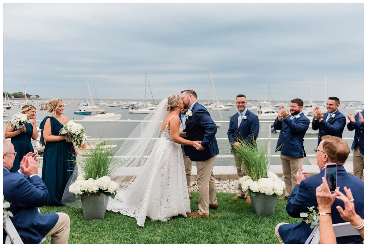 first kiss at duxbury waterfront wedding