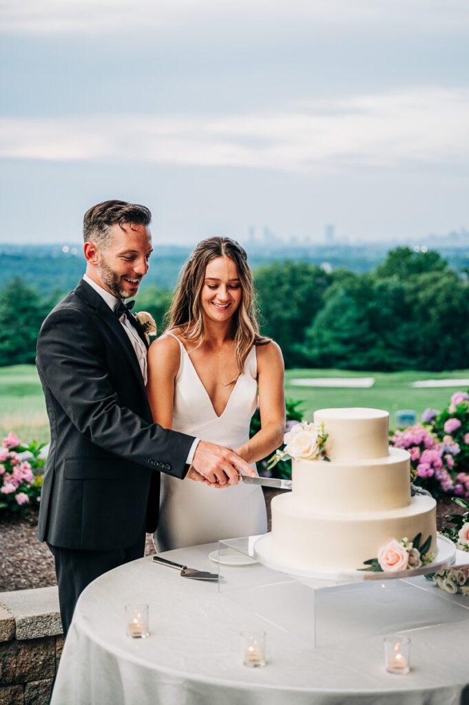 Baltimore wedding photographer shot of cake cutting