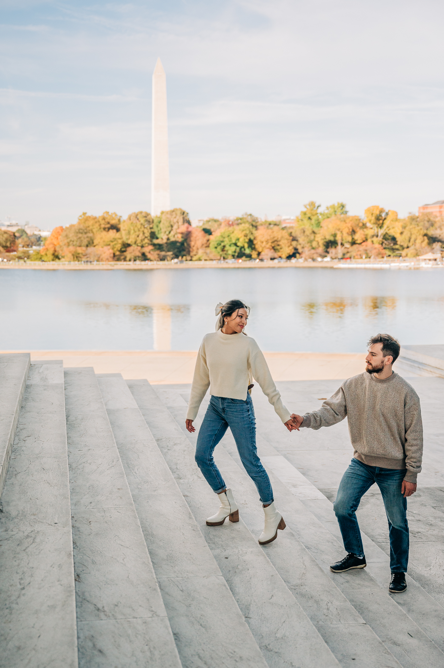 jefferson memorial engagement photo taken on the steps in DC with washington monument in background