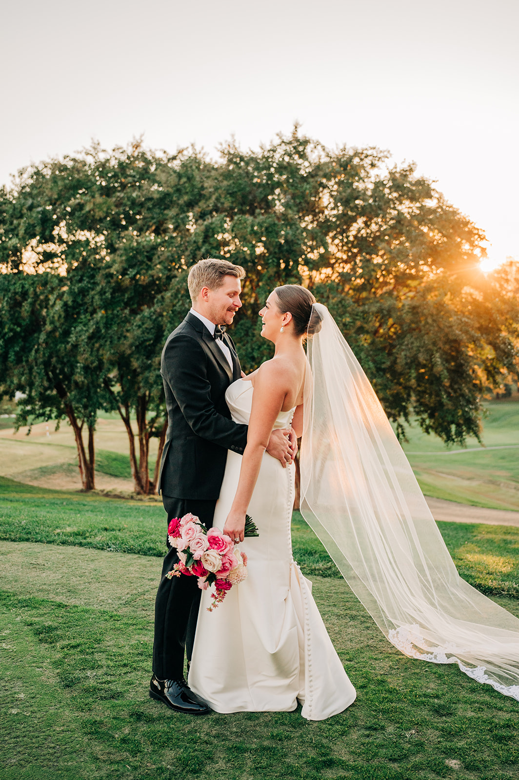 a bride and groom portrait at sunset at a hunt valley country club wedding